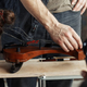 Illustration for article titled Listen to a violin made from still-attached human hair